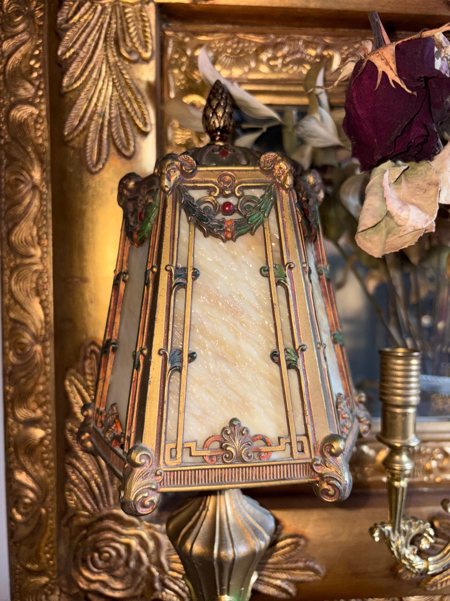 Art Nouveau style jeweled table lamp with slag glass and Ram head Motifs