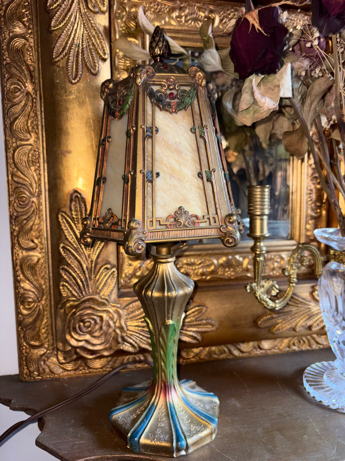 Art Nouveau style jeweled table lamp with slag glass and Ram head Motifs