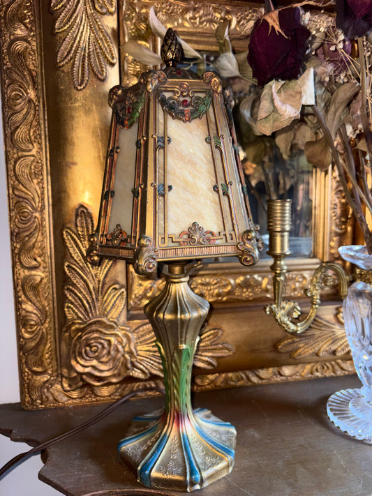 Art Nouveau style jeweled table lamp with slag glass and Ram head Motifs