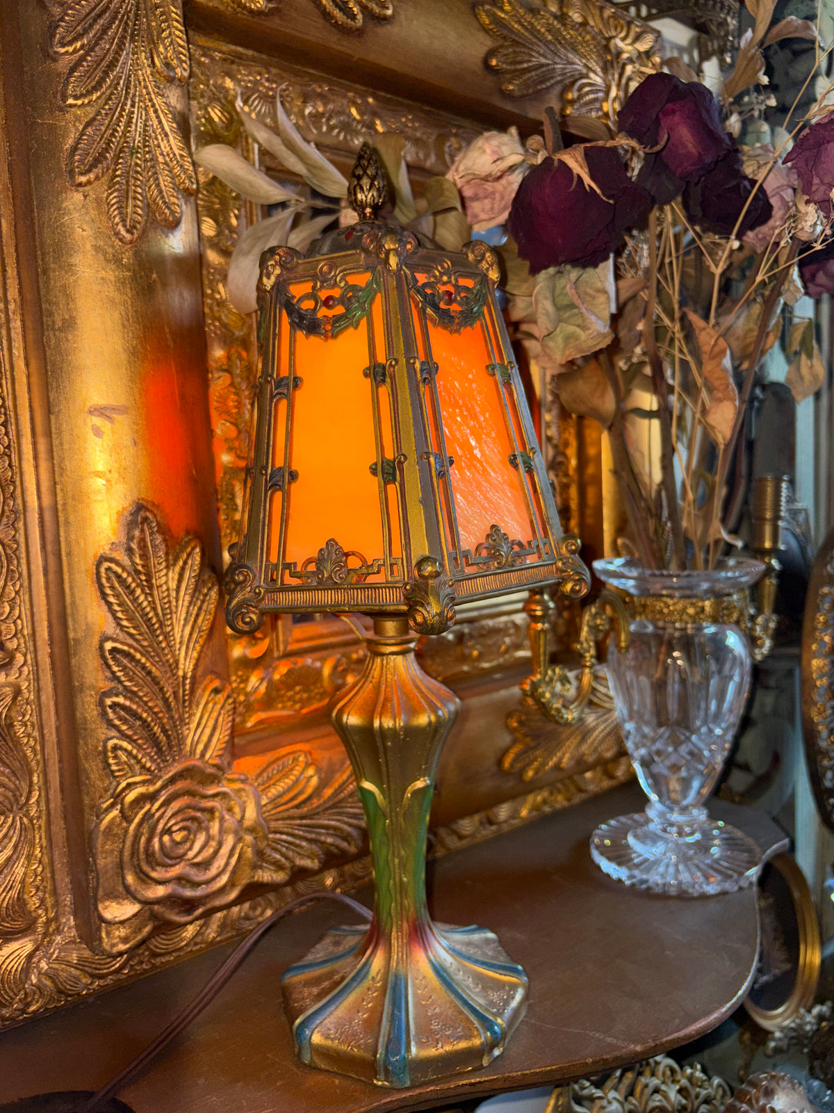 Art Nouveau style jeweled table lamp with slag glass and Ram head Motifs