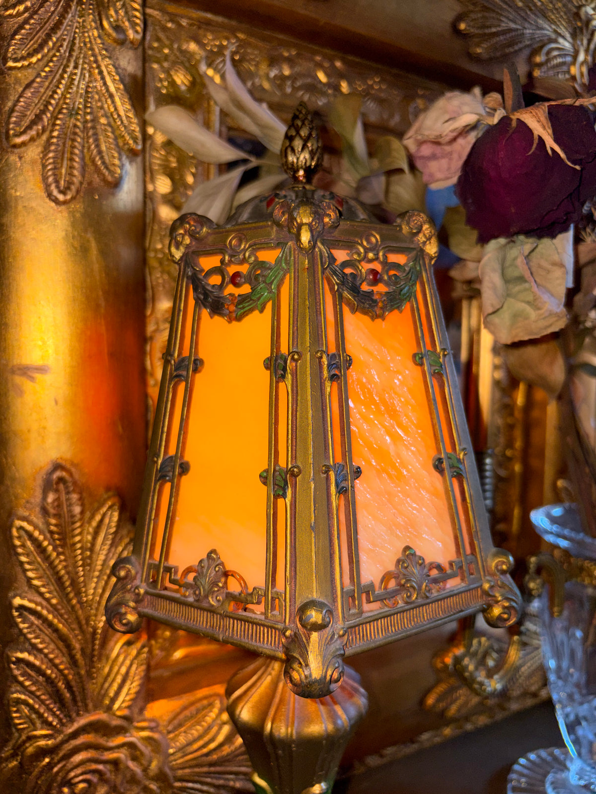 Art Nouveau style jeweled table lamp with slag glass and Ram head Motifs