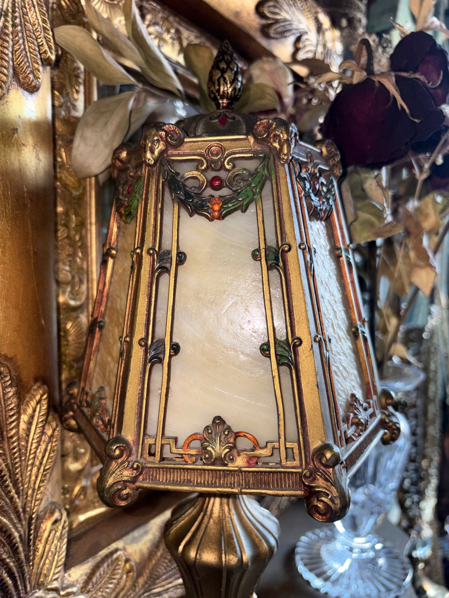 Art Nouveau style jeweled table lamp with slag glass and Ram head Motifs